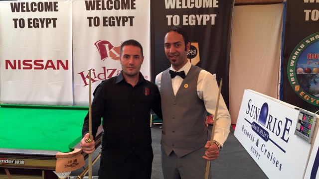 Ahmed Aly Elsayed (right) pictured with his first opponent in Group G, Haitham Shikh Khalil of Syria -  IBSF
